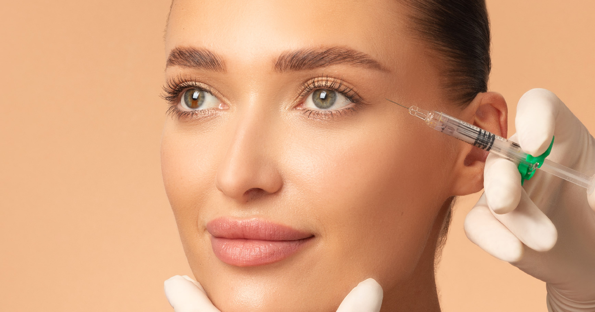 A Injector injecting sculptra to a patient in Alpharetta, GA