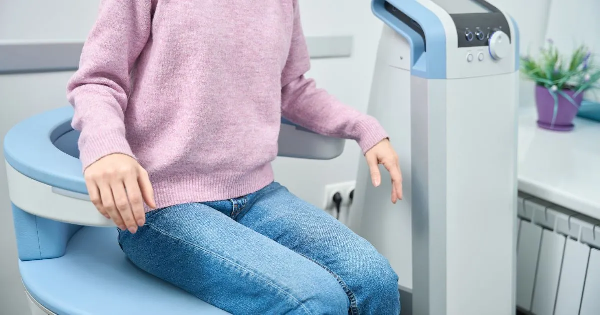 Patient receiving Emsella Treatment in Alpharetta, GA for pelvic floor health